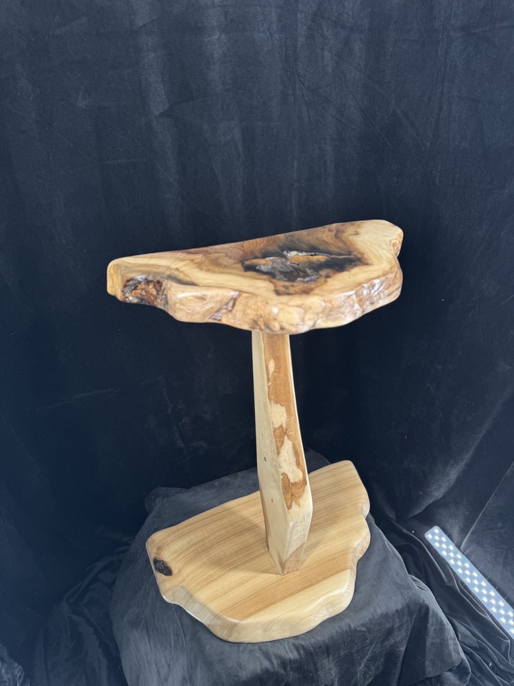 Pedestal accent table with resin-inlaid live-edge top
