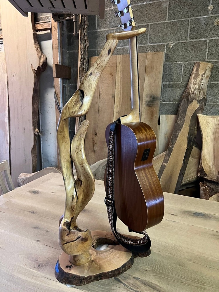 Sculptural handmade wooden guitar stand